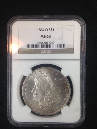 1884 - O Morgan Silver Dollar Toned Graded Ms - 63 By Ngc photo