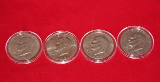 1971,  1972,  1974,  And 1977 Us Eisenhower 4 Silver Dollars Very Good photo