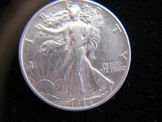 1944 Walking Liberty Half Dollar Silver Coin. photo