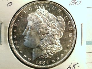 1884 0 Morgan Dollar In Bu 90% Silver Coin Blue photo