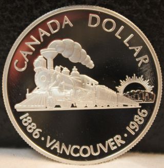 1986 Canada Silver Dollar Transcontinental Railroad Anniversary 100 Years photo