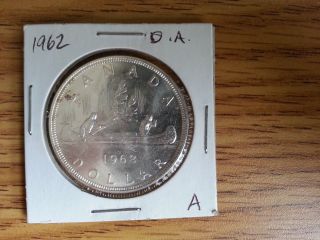 1962 Canada Silver Dollar - Double Arrow Head.  Grade.  See Pics.  A photo