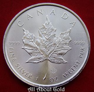 Silver Coin 1 Oz 2014 Canada Canadian Maple Leaf.  9999 Fine Radial Lines Rays Bu photo