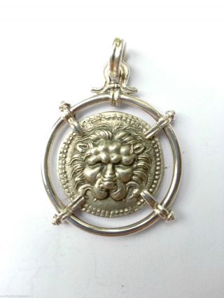 Lion Mask Facing Within Dotted Circle Forepart Of Bull Right Pendant Necklace photo