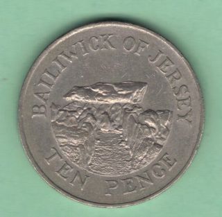 1988 Jersey. .  10 Pence Coin.  Km 57.  1.  La Houque Bie,  St.  Martin.  Historic Site. photo