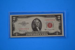 One 1953 C Uncirculated $2.  00 Red Seal Star Note photo