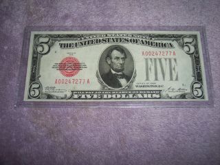 1928 Red Seal United States Note In Crisp Uncirculated. photo
