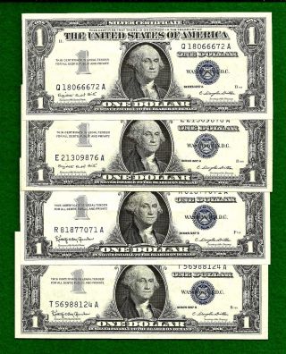 4 1957 One Dollar Silver Certificates photo