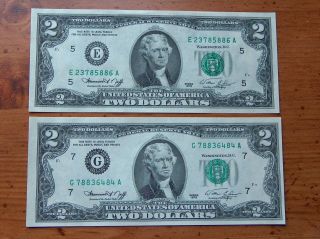 (2) 1976 $2 Federal Reserve Notes W/holder (ccu) photo