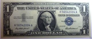 1957 - $1,  00 