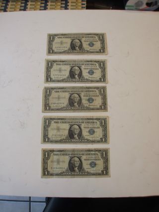 1957 5 - Circulated Silver Certificates One Money photo