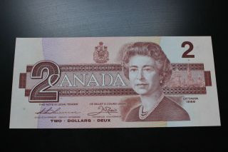 Canadian 1986 $2 Bill Bird Series.  The Bill Is,  Crisp & Uncirculated. photo