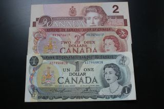 Canadian $5 Worth 1986 $2,  1974 $2 & 1973 $1.  Take A Look At The Pictures. photo