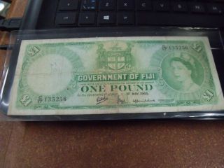 1965 One Pound,  Fiji.  Scarce Banknote. photo