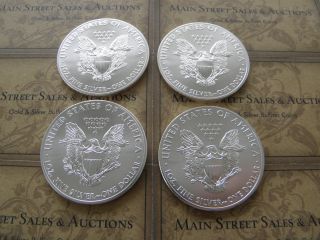 (4) - 2014 American Eagle Silver 1 Oz Bullion Coin Fresh Out Of Tube Bu photo
