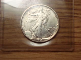 United States Silver Eagle Dollar,  1990 Bullion,  0.  999 Fine photo