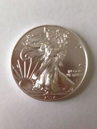 2012 1 Oz.  999 Fine Silver Liberty Walking American Silver Eagle Dollar Coin Unc photo