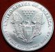 Uncirculated 1999 American Eagle Silver Dollar Silver photo 1