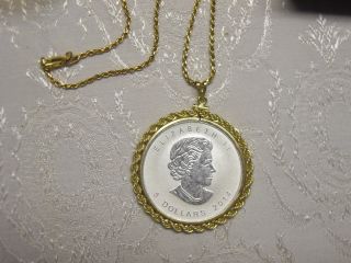 $5.  00.  9999 Silver Maple Leaf Pendant Necklace Brilliant Uncirculated. photo