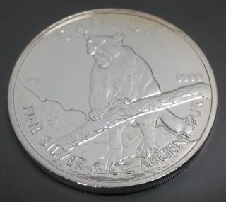 2012 1 Oz Silver Cougar - Royal Canadian Wildlife Series.  9999 Fine Silver photo
