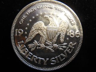 1986 1 Troy Oz. .  999 Fine Silver Liberty Silver Coin photo