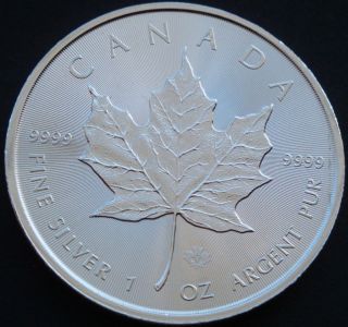 2014 - 1 Oz Canadian Silver Maple Leaf Brilliant Uncirculated Fine Silver Coin photo