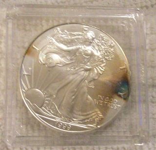 Silver American Eagle Coin 1999 - Toning - Brilliant Uncirculated photo