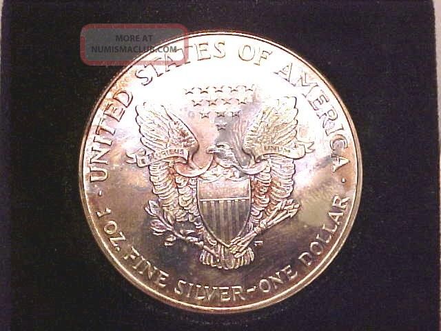 2000 Millennium Gem 999 Silver Eagle Silver Dollar Coin In Velvet Packaging 2000-millennium-silver-dollar-beck-auctions-inc