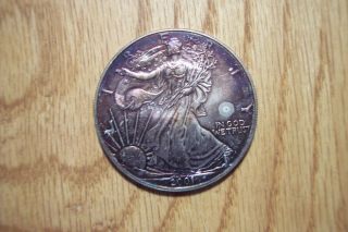 2001 Silver American Eagle With Monster Purple Toning On Obverse photo