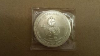 1972 Universaro,  1 Troy Oz.  Silver World Trade Coin photo