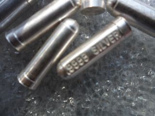 1/10th Silver Bullet.  22 Cal Design.  9999 photo