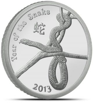 2013 Year Of The Snake 1oz Silver Round.  999 Fine photo