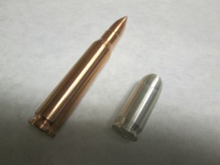 1.  999 Fine Silver Oz Bullet Bullion Round photo