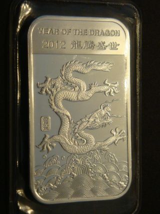2012 - 1 Oz Year Of The Dragon Brilliant Uncirculated Fine 0.  999 Silver Bar photo