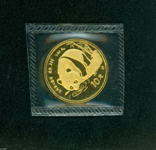 1987 - S 10y 10 - Yn 10 Yuan 1/10 Oz.  Panda Gold Coin China photo