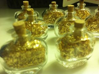 1 Troy Ounce.  999 Gold Bullion 18 Precious Gold Flake Bottles Bid Now photo