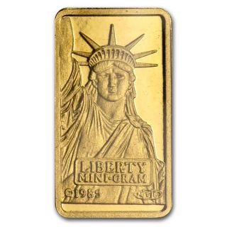Gold 1 Gram Pure.  999 Statue Of Liberty Gold Bar Credit Suisse $9.  99 photo