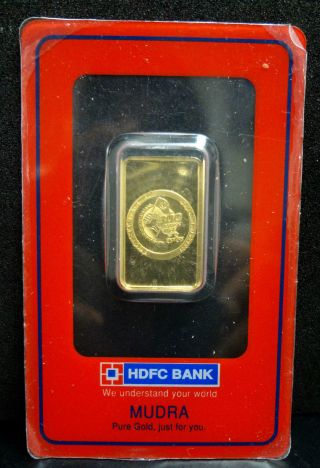 Hdfc Bank 10 Gr 999.  9 Fine Gold Bar - Round photo