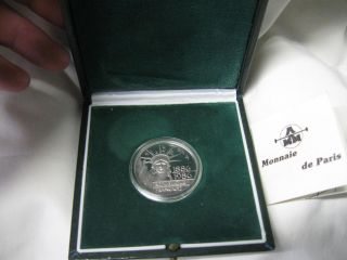 1986 Platnium Coin 100 Franc Liberty With.  999 20gm No.  2694 photo