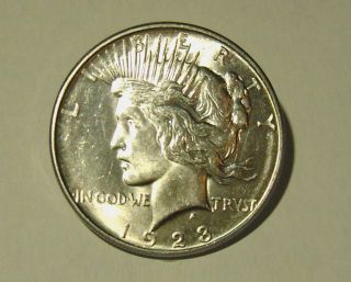 1923 Peace Dollar,  Uncirculated,  White photo