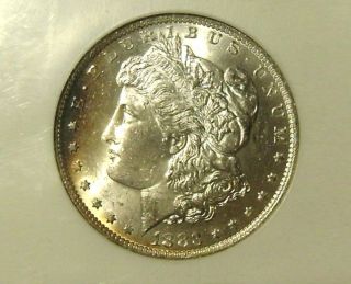 1883 O Morgan Dollar,  Ngc Ms 64,  White With Light Toning photo