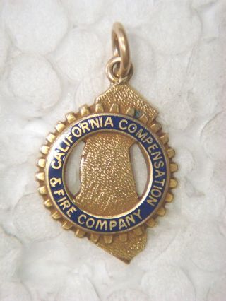 Gold Charm - California Compensation And Fire Company photo