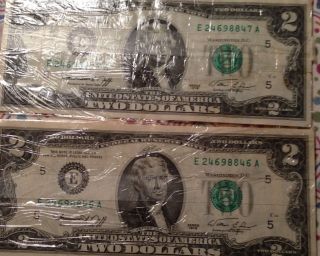 Two 2 Dollar 1976 Bills.  In Wrap They Were Put In After Getting From Bank. photo