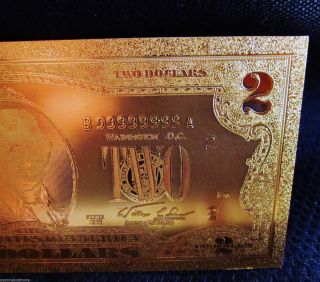 24kt.  Gold $2 Bank Note Quality Gold Foil Individually Die Struck photo