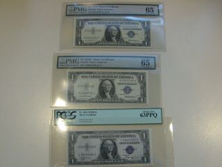Three $1.  00 Uncirculated Silver Certificates - 1 Pcgs 1935b - 1 Pmg 1935f - 1 Pmg 1957 photo
