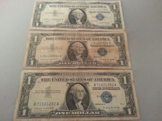 3 Series 1957 A One Dollar Silver Certificate photo