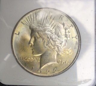 1922 - Peace Silver Dollar Certified Ms63 By Ngc Light Gold With Hint Of Color photo