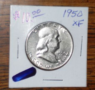 1950 Silver Franklin Half Dollar. . .  Grades 