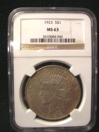 1923 Silver Peace Dollar. . . .  Ms 63. . .  Graded By Ngc. . . . .  Take A Look photo
