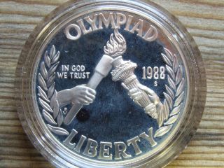 1988 - S Olympic Proof Silver Dollar In Plastic Case.  90 Silver photo
